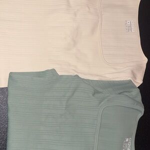 Cream and Green Ribbed Body Suits
Brand new never worn